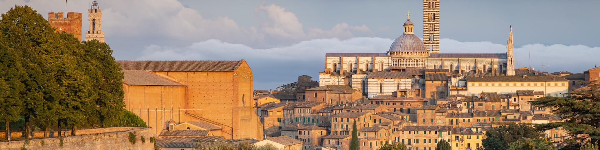 Fortezza Medicea featuring a sunset, a city and landscape views