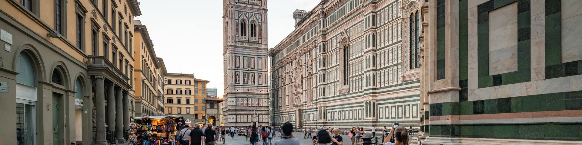 Giotto\'s Campanile showing street scenes, a city and heritage architecture