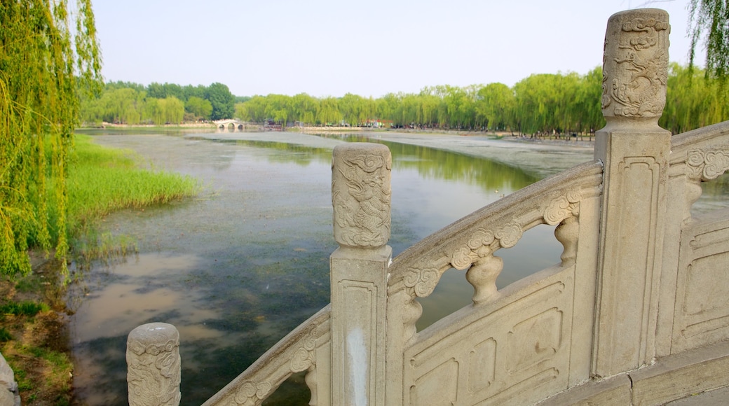 Old Summer Palace featuring a bridge and a river or creek