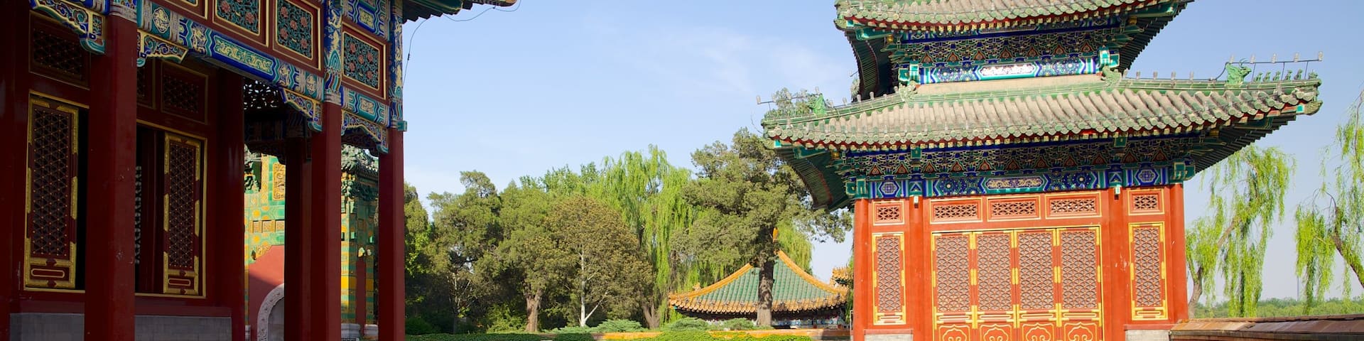 Beihai Park featuring a temple or place of worship, a pond and heritage architecture