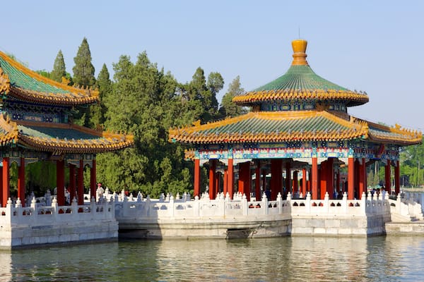 Beihai Park which includes a temple or place of worship, heritage architecture and a river or creek