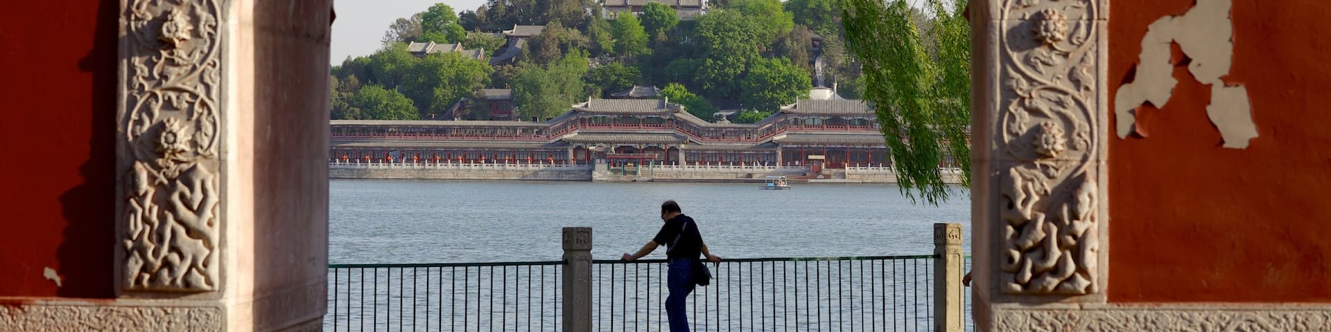 Beihai Park showing views as well as an individual femail