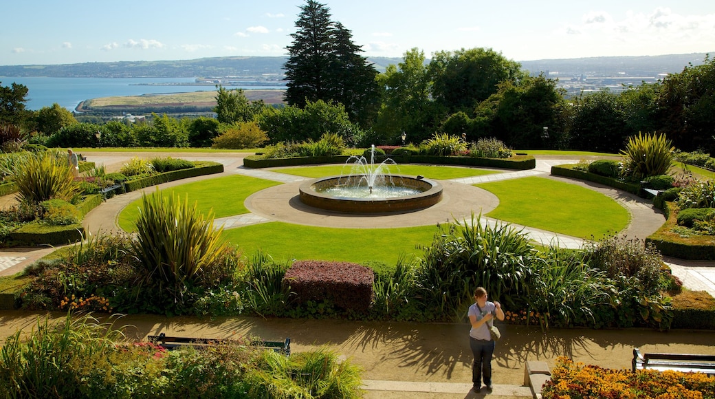 Belfast Castle featuring a fountain, a garden and a castle