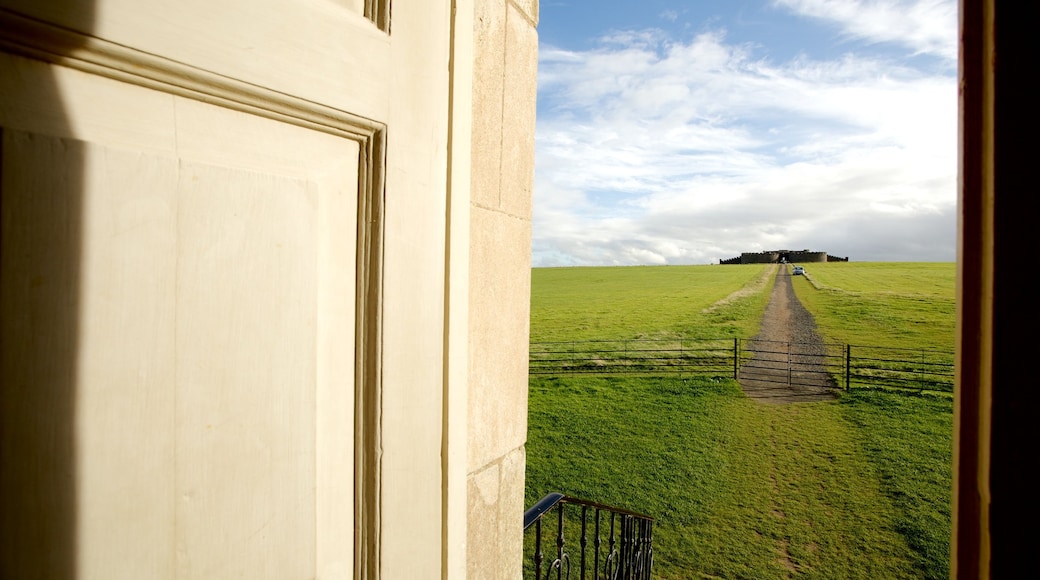 Mussenden Temple which includes tranquil scenes and a temple or place of worship