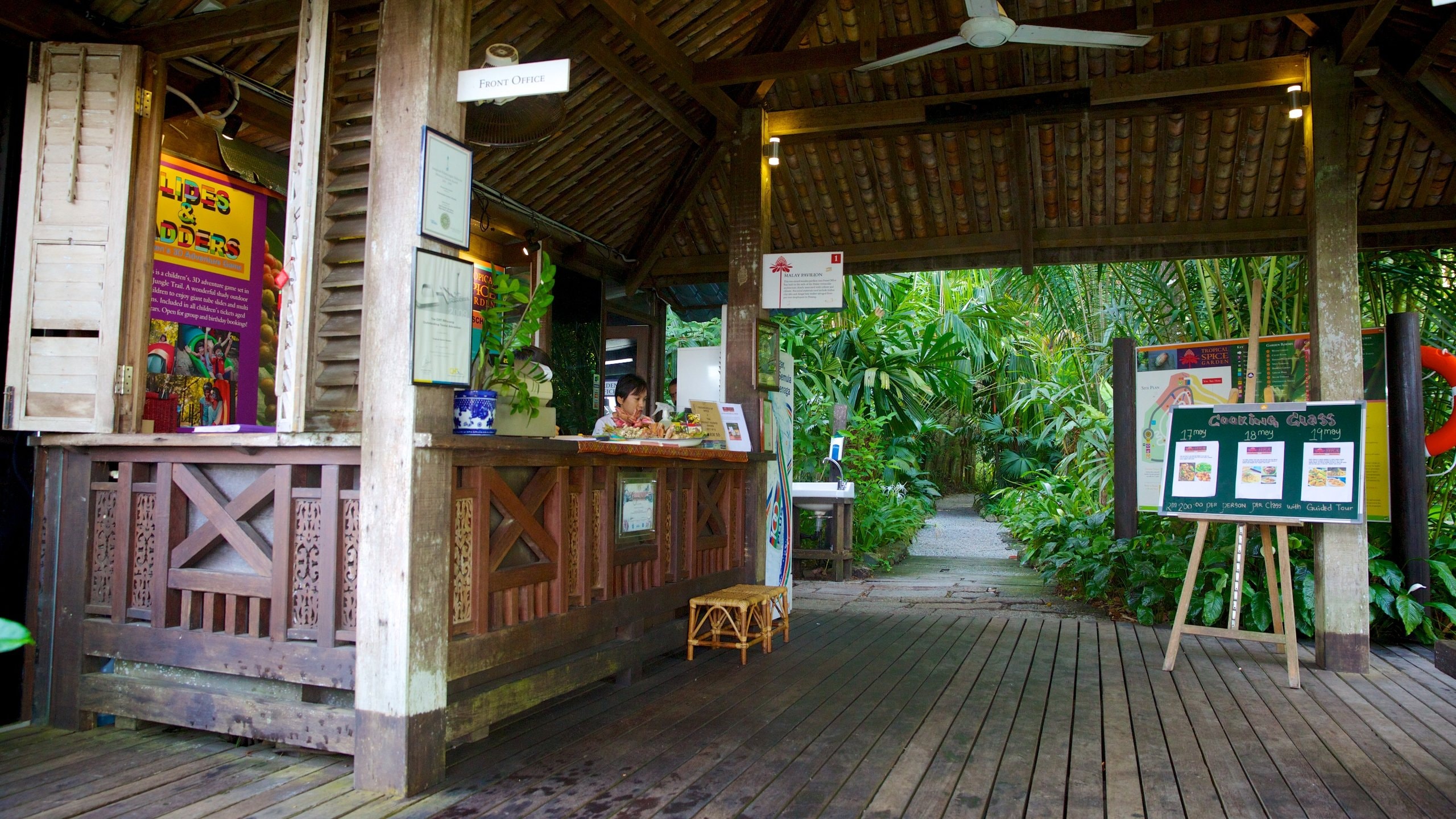 Tropical Spice Garden showing a bar and a park