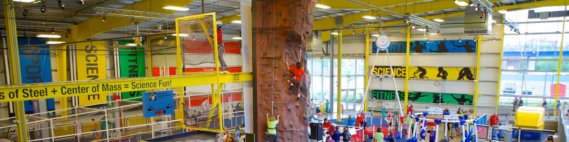 Carnegie Science Center showing interior views and climbing as well as a large group of people
