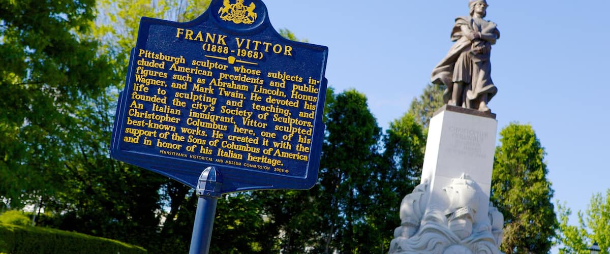 Schenley Park featuring a statue or sculpture, a memorial and signage