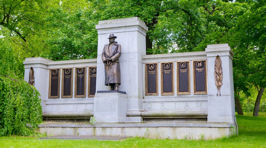 Schenley Park which includes a memorial, a statue or sculpture and a garden