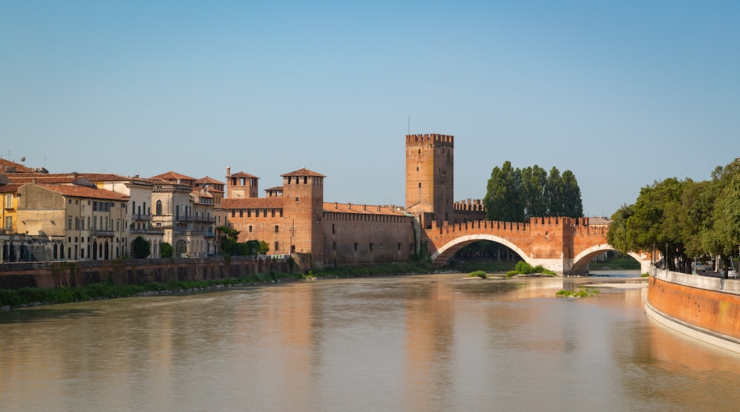 Ponte Scaligero which includes a river or creek and a bridge