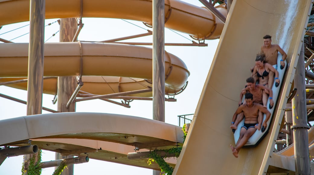 Aqualandia featuring a waterpark as well as a small group of people