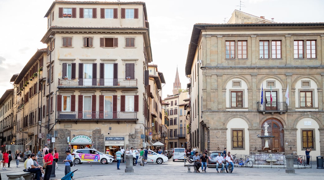 Piazza Santa Croce featuring street scenes