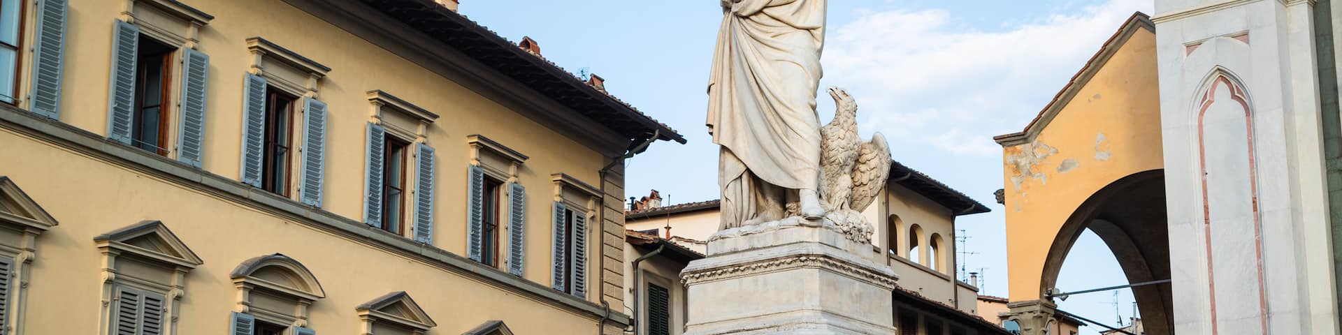 Piazza Santa Croce featuring a statue or sculpture