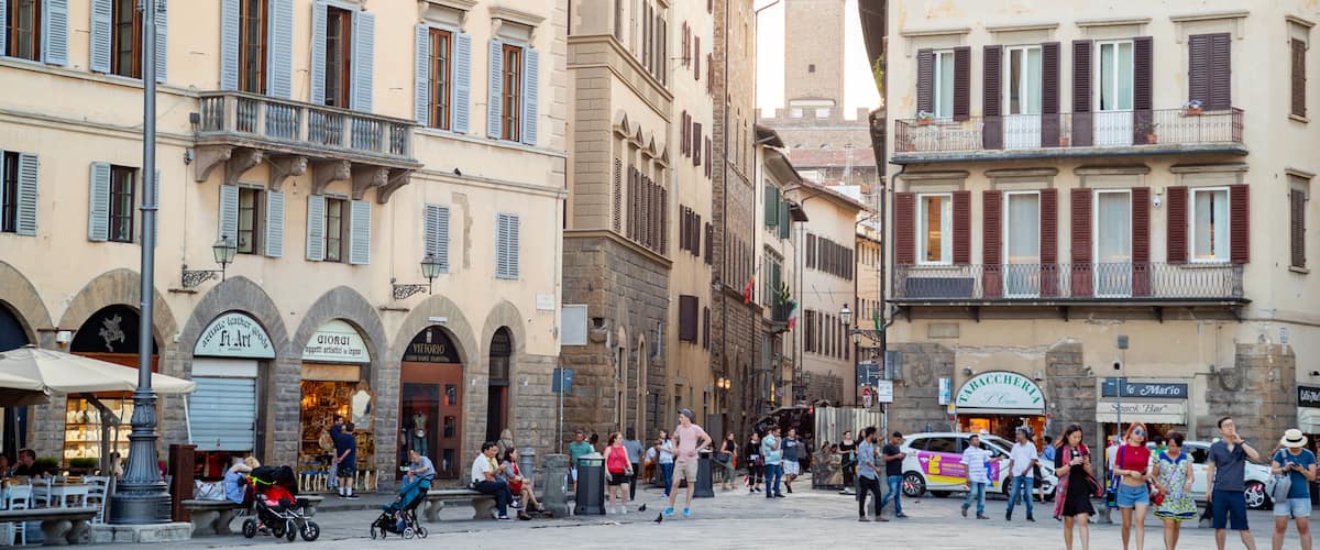 Piazza Santa Croce showing a city and street scenes