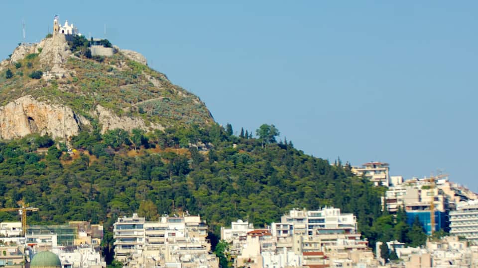 Mount Lycabettus which includes mountains and a city