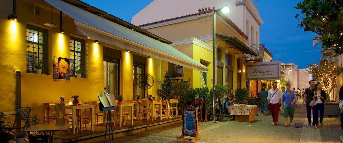 PlĂĄka montrant scĂšnes de rue, dĂźner en ville et scĂšnes de nuit