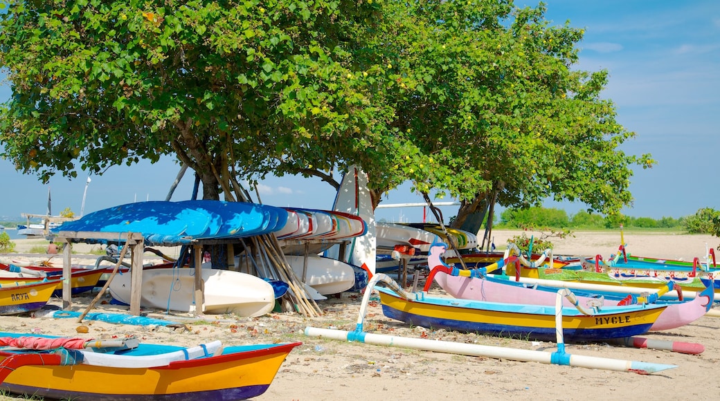 Sanur Beach showing boating, a beach and tropical scenes