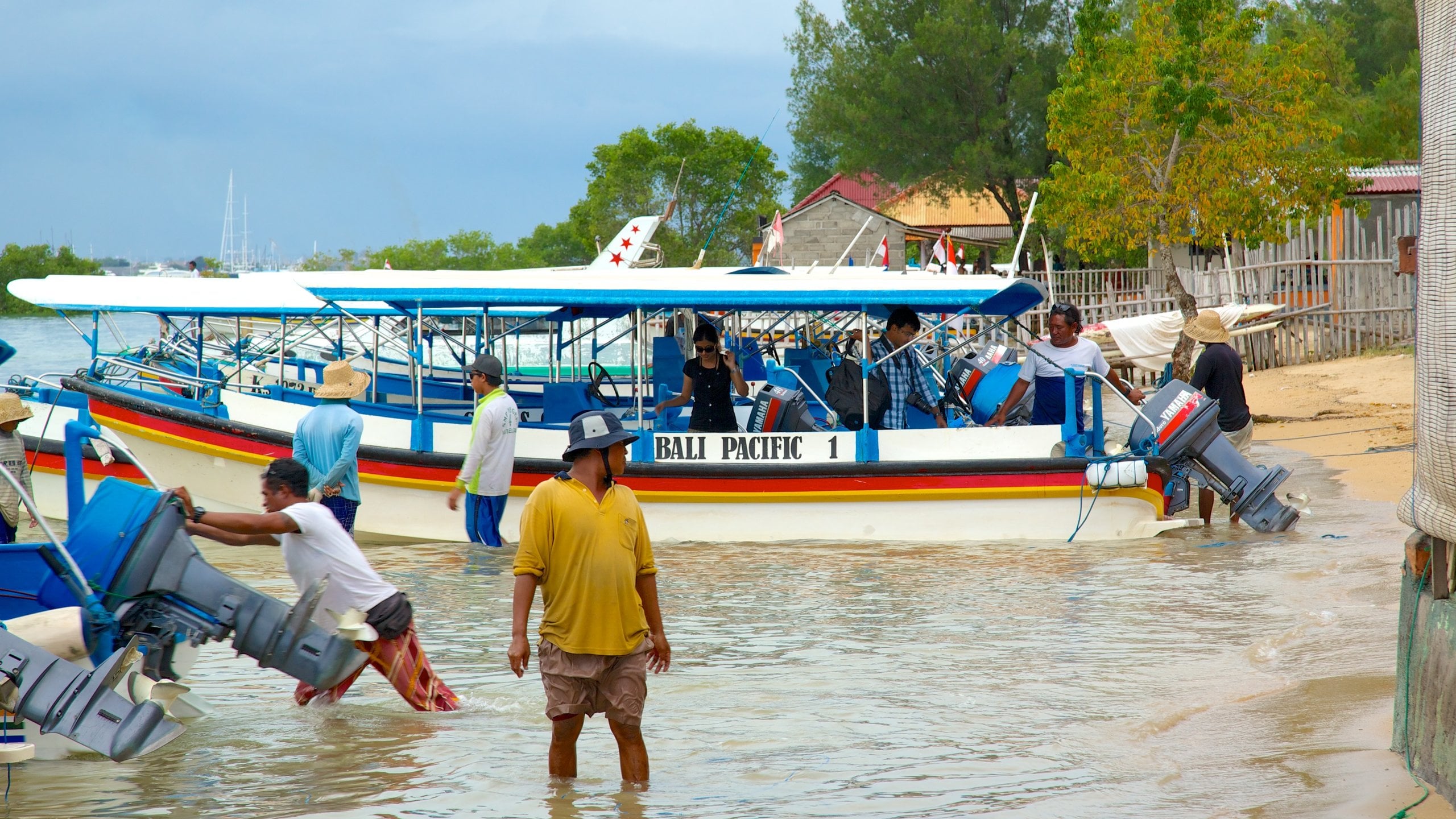 Turtle Island which includes boating and a beach as well as a large group of people