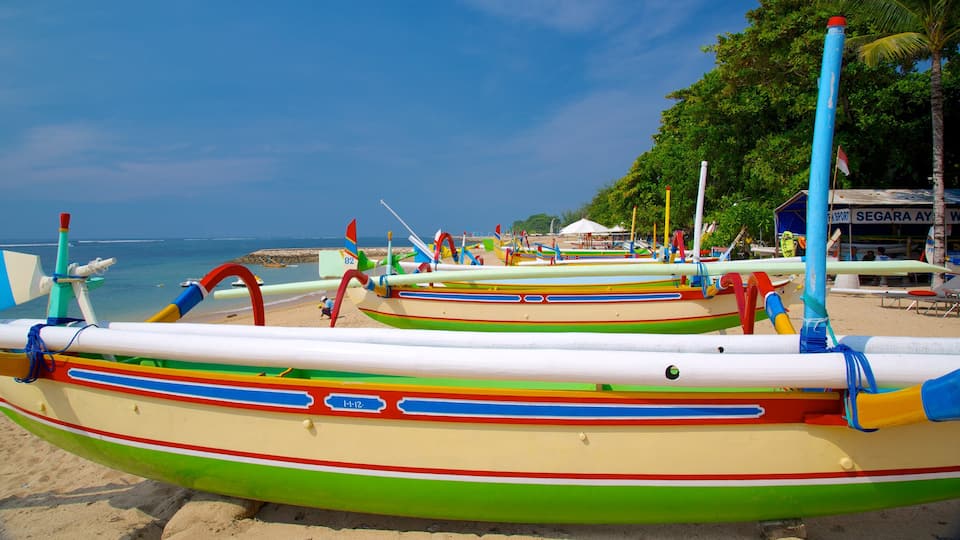 Segara Beach featuring tropical scenes, boating and a beach