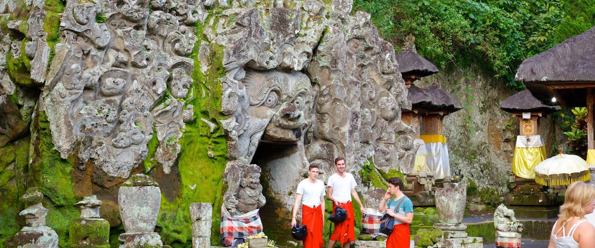 Elephant Cave which includes caves, religious aspects and a temple or place of worship