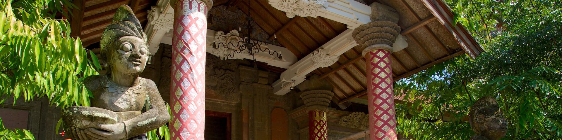 Agung Rai Museum of Art which includes a temple or place of worship, religious aspects and a monument