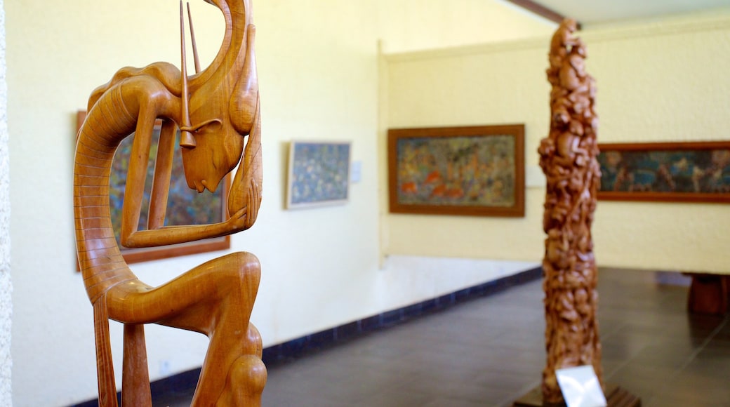 Museum Puri Lukisan which includes interior views, art and a statue or sculpture
