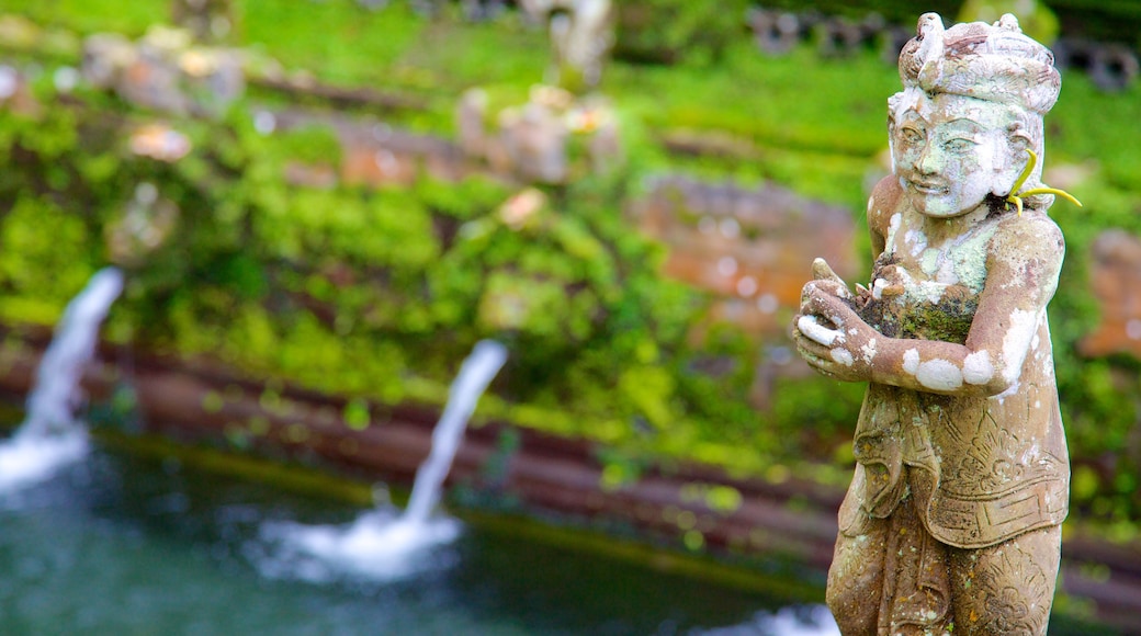 Gunung Kawi Temple featuring religious aspects and a statue or sculpture