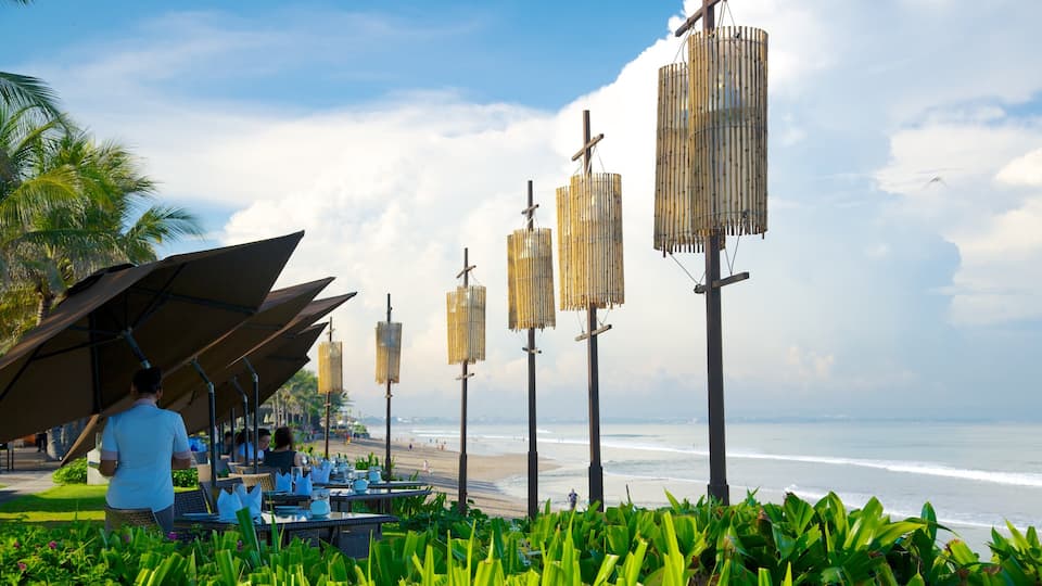 Seminyak que inclui paisagens litorâneas e cenas tropicais