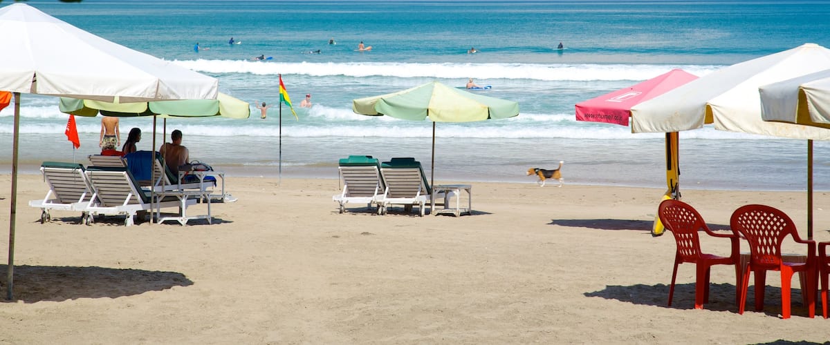 Double Six Beach showing tropical scenes and a beach
