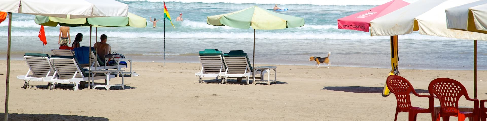 Double Six Beach showing tropical scenes and a beach