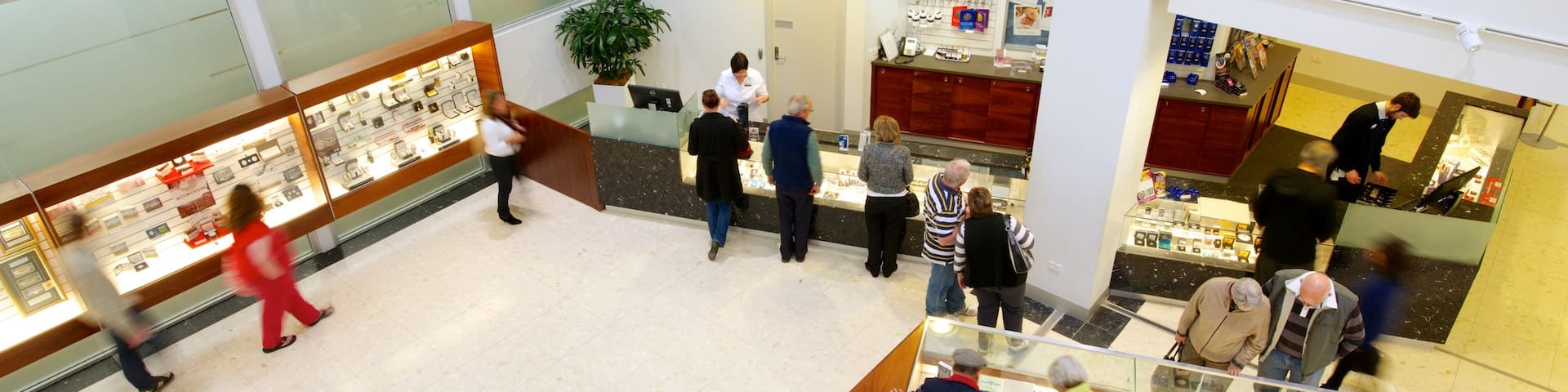 Royal Australian Mint showing interior views as well as a large group of people