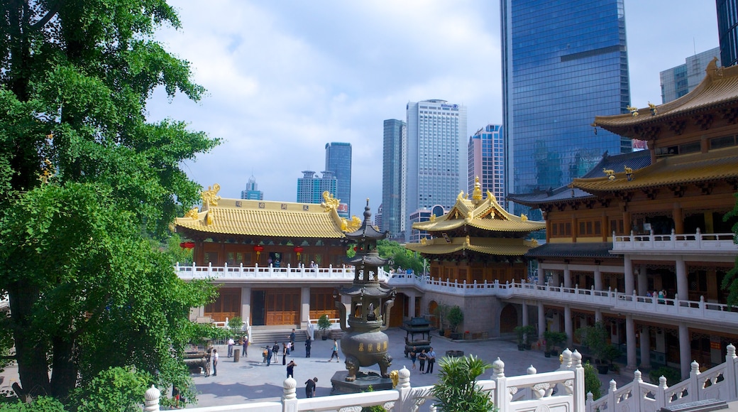 Jing An Temple which includes a city and a temple or place of worship