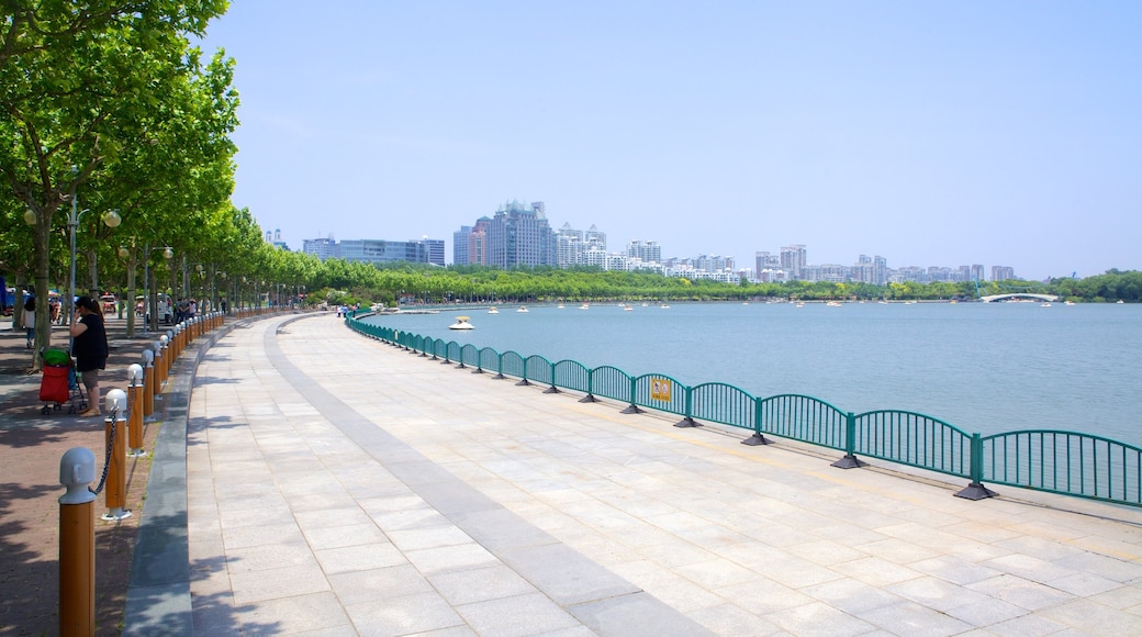 Century Park showing a river or creek and a city