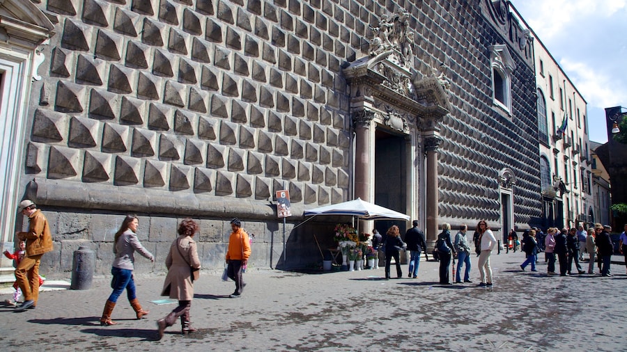 Church of Gesu Nuovo featuring street scenes as well as a large group of people