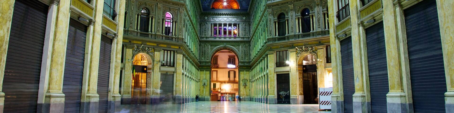Galleria Umberto featuring night scenes and interior views