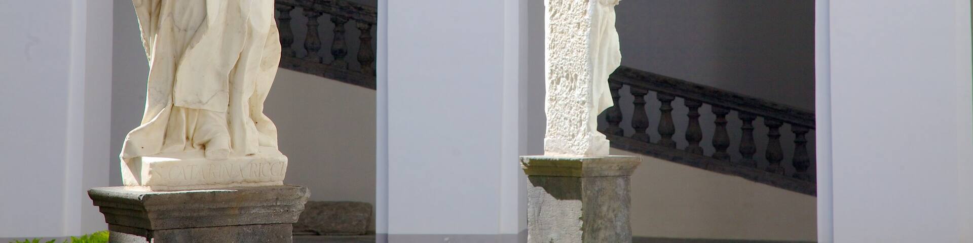 Piazza San Domenico Maggiore featuring a statue or sculpture and religious aspects