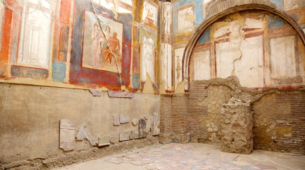 Ercolano showing building ruins, heritage architecture and interior views