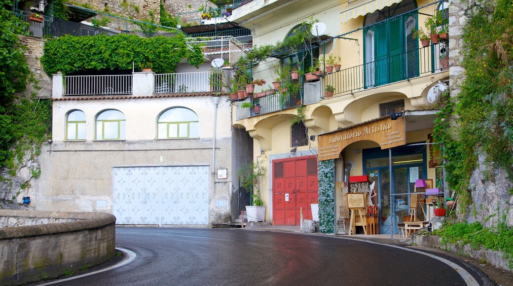 Positano featuring a house and street scenes