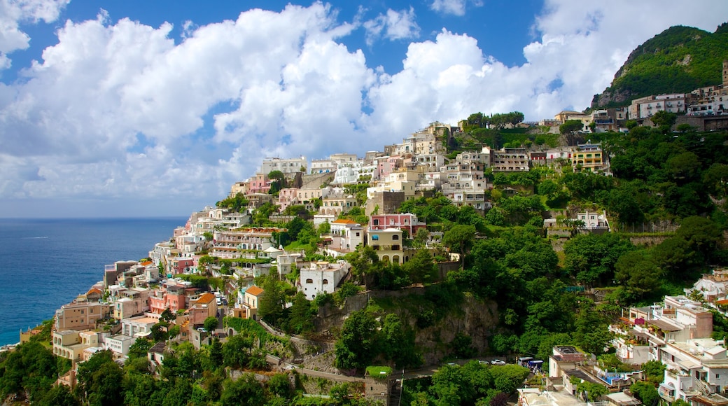 Positano showing mountains, a coastal town and general coastal views