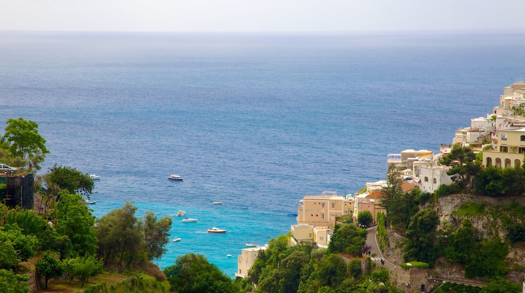 Positano showing a coastal town, a city and mountains