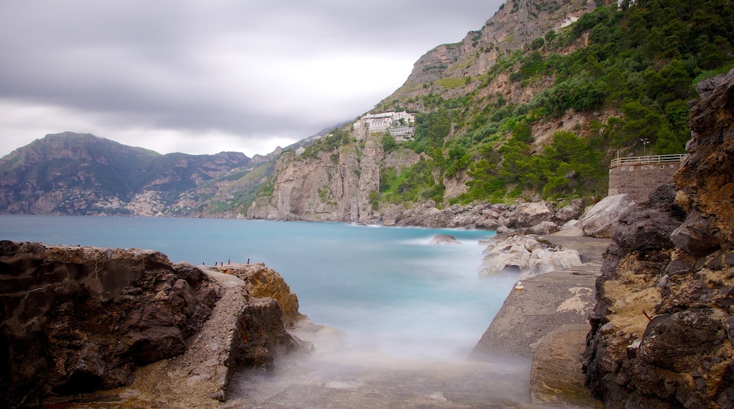 Praiano showing general coastal views, rugged coastline and mist or fog