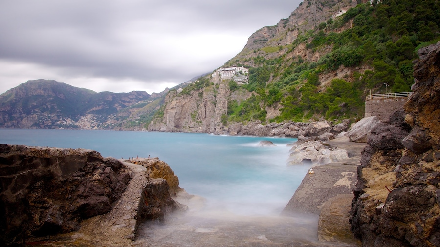 Praiano showing general coastal views, rugged coastline and mist or fog