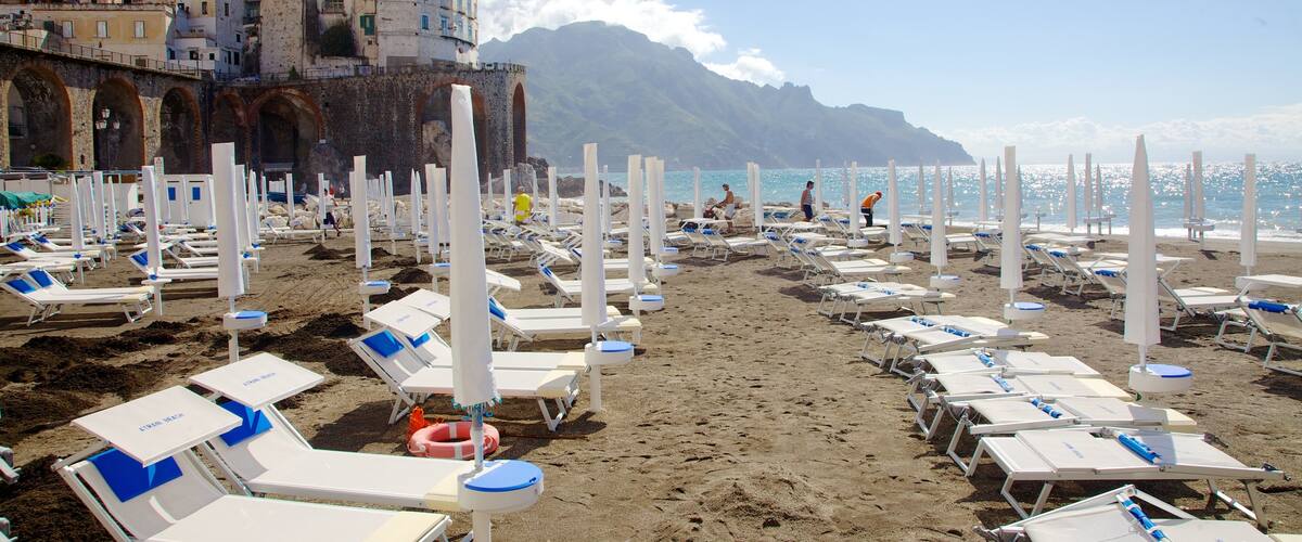 Atrani which includes a sandy beach, a luxury hotel or resort and a coastal town