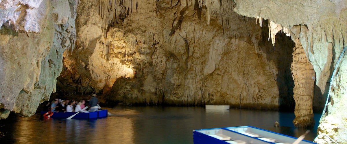 Emerald Grotto which includes boating, caves and caving