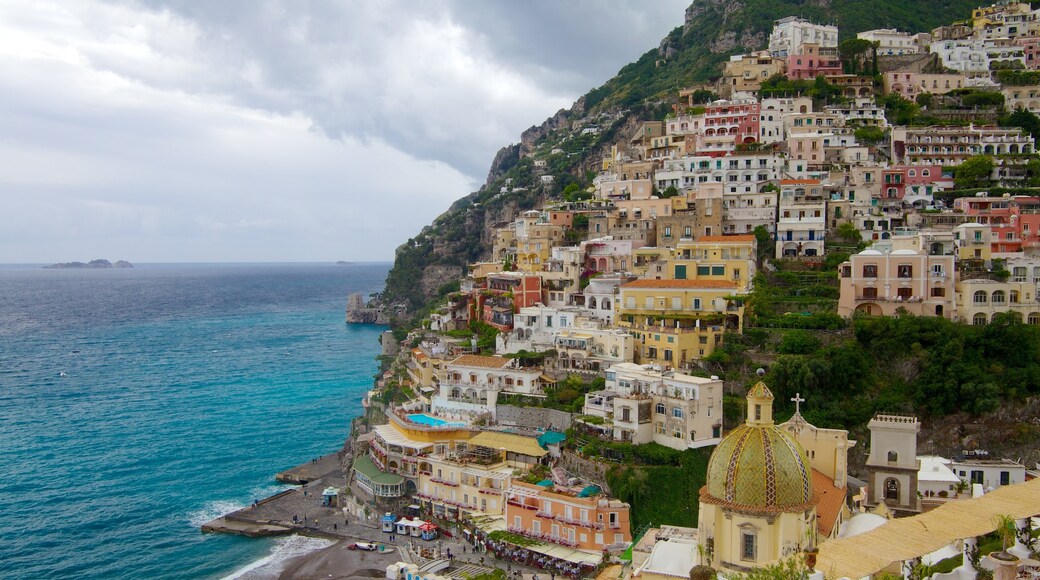 Church of Santa Maria Assunta featuring general coastal views, a coastal town and a city