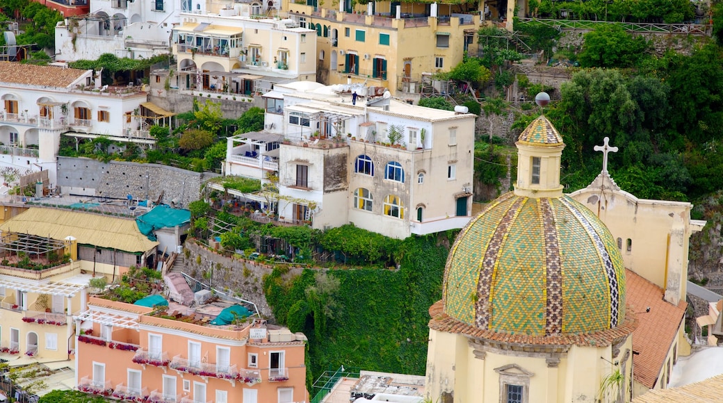 Church of Santa Maria Assunta featuring a city and a church or cathedral