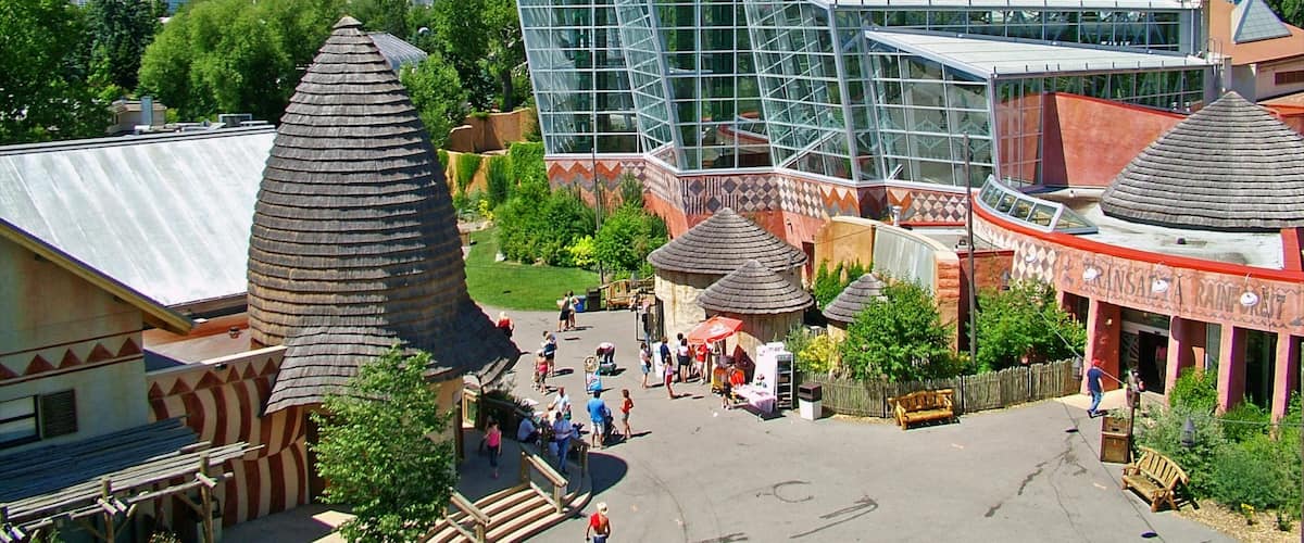 Calgary Zoo which includes modern architecture, zoo animals and a city