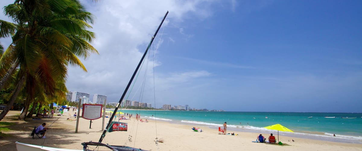 Isla Verde Beach featuring boating, sailing and a beach