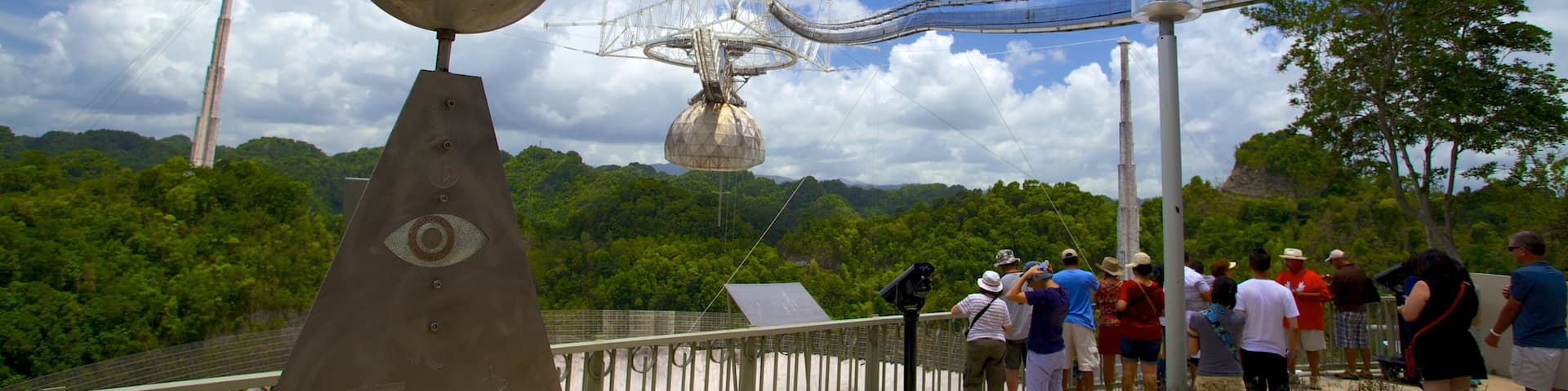 Arecibo Observatory which includes an observatory and forest scenes
