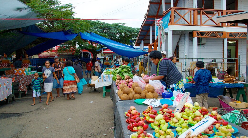 Suva mettant en vedette marchés et scÚnes de rue aussi bien que important groupe de personnes