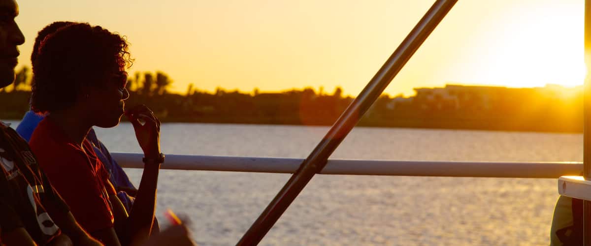 Port Denarau which includes general coastal views, a sunset and boating